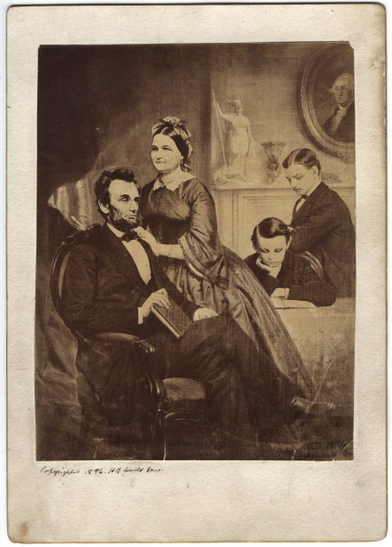 Historic family portrait of Abraham and Mary Lincoln with their sons Willie and Tad gathered together in a formal interior setting.